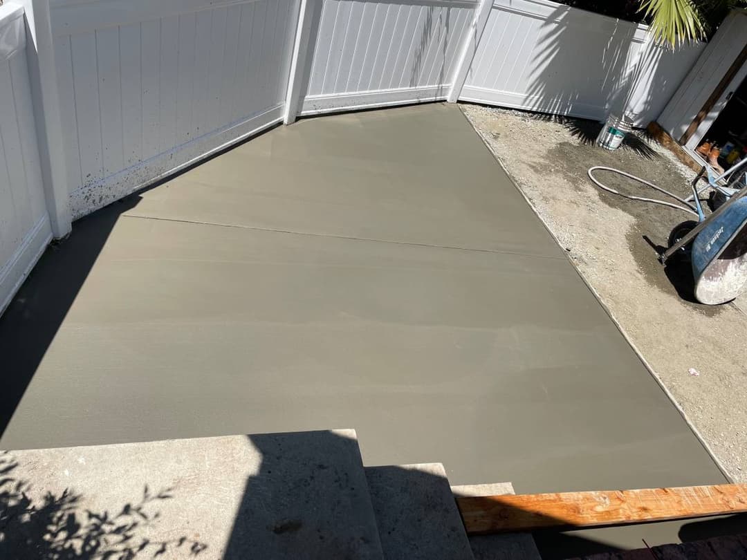 picture of a concrete deck in a residential backayrd in san diego california